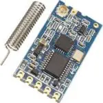 Module électronique bleu avec antenne spirale argentée