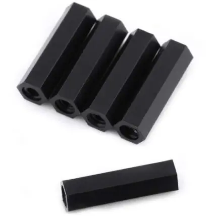 Entretoises hexagonales noires pour montage électronique
