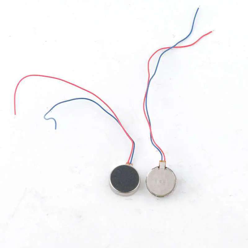 Micro moteur à vibrations CC, moteurs à boutons vibrants plats, pièces de téléphone 3V-5V, 60mA, 70MA.jpg15-01-2025-11-11 Micro moteur a vibration cc 3v 5v compact et polyvalent – Image 1