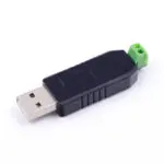 Adaptateur USB vers RS485 compact, connecteur USB d'un côté, bornier RS485 de l'autre, fond blanc.