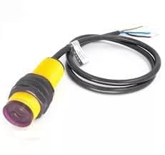 Capteur de proximité cylindrique jaune avec câble noir