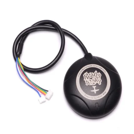 Module GPS rond avec câble multicolore et connecteur blanc